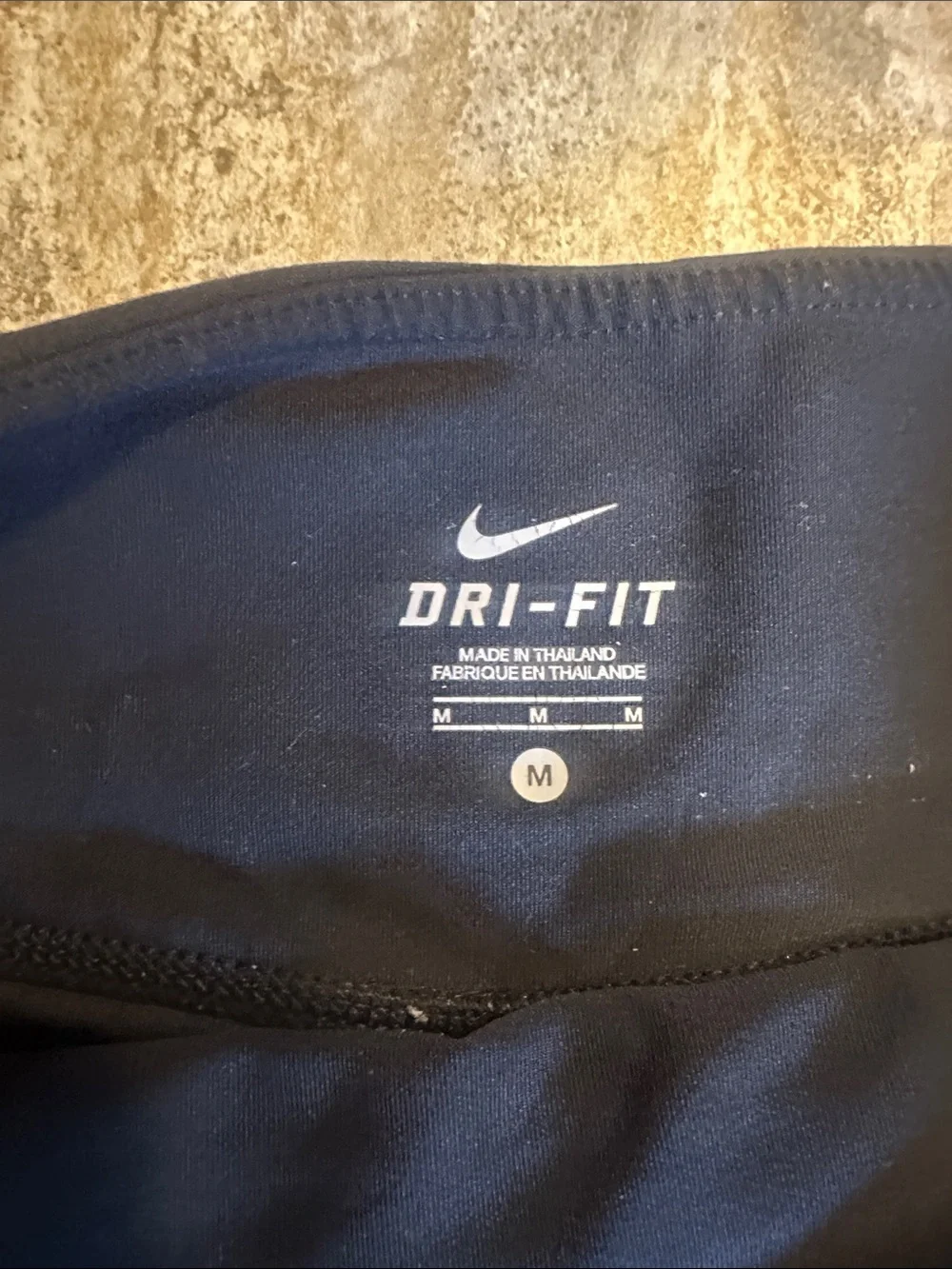 Nike Women’s Black Capri Workout Leggings - loose at knee - with White Swoosh